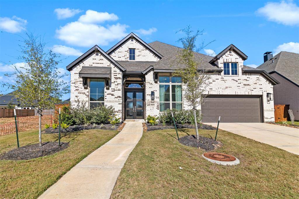 Stunning home built by Highland Homes. Completed in 2024.  It has a three car tandem garage and double wide driveway.