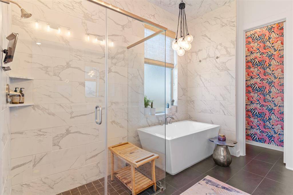 Loving the pop of custom wallpaper in the water closet!