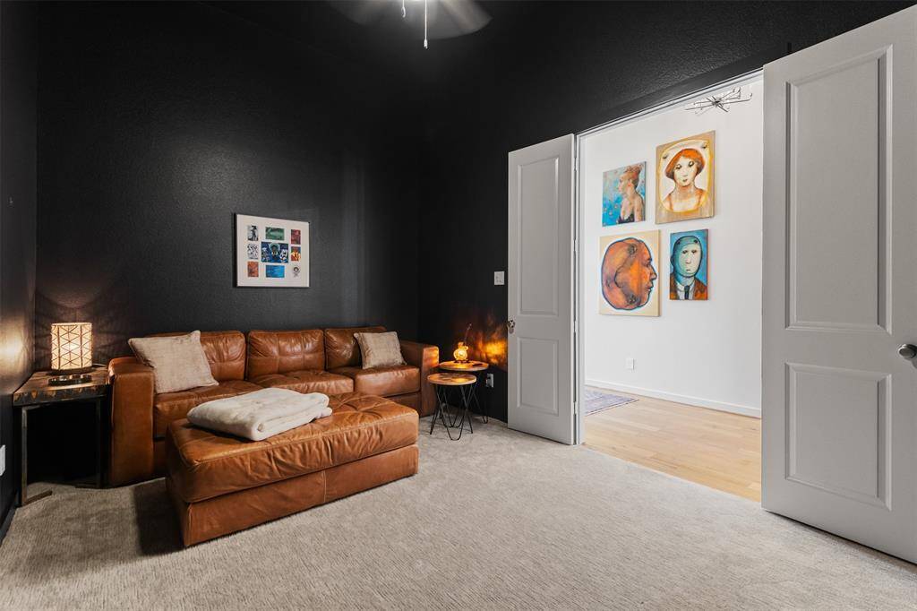 Freshly painted media room that opens to the foyer.