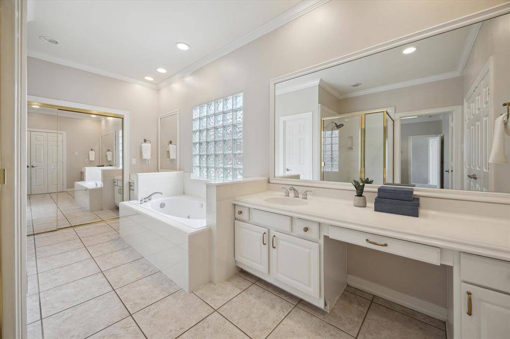 Primary bath features dual vanities