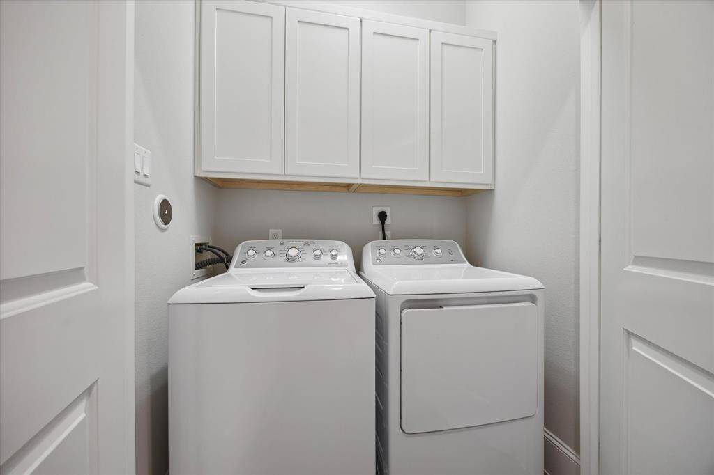 The washer and dryer convey with the home and are conveniently located on the second floor—making laundry day a breeze with easy access to the main living areas and bedrooms.