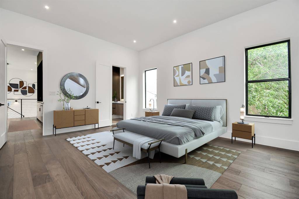 Versatility and comfort in this oversized and captivating bedroom, which offers the flexibility to transform into a media room if desired.