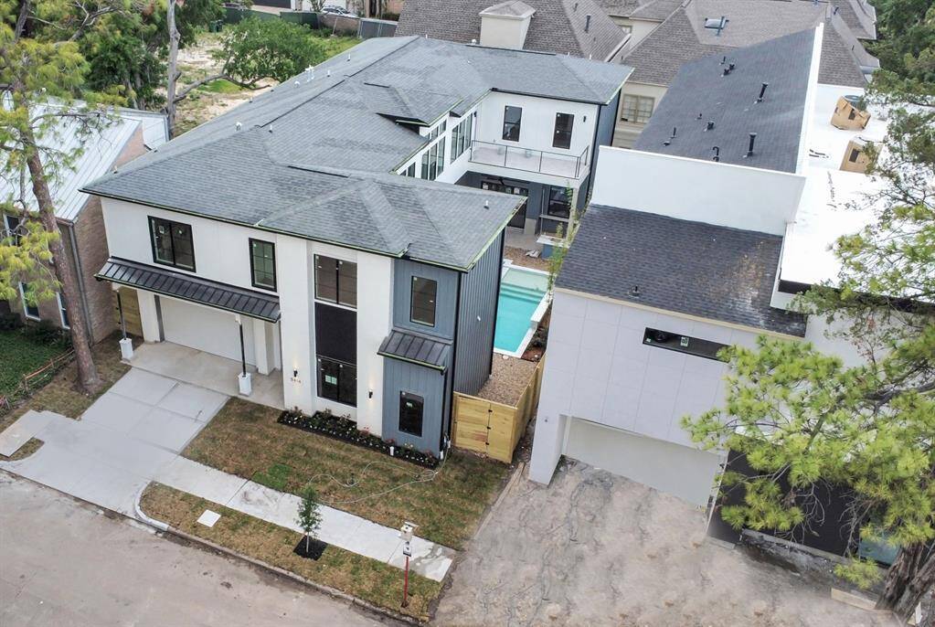 This home sits on an expansive lot, 6000sqft, with ample yard space in front and the back, lush landscaping, a well-maintained yard, and a pool & spa.