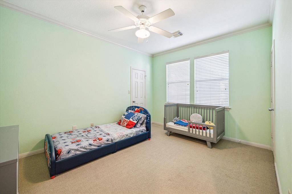 Secondary Bedroom Two – 14 x 11:  Located on the third floor with private bath.  Wall to wall carpet, baseboards, crown molding, walk-in closet and ceiling fan.