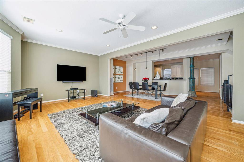Living Room - 23 x 12: Another view of the living room with space to accommodate and oversized television as well as a second seating area. Opens to dining room