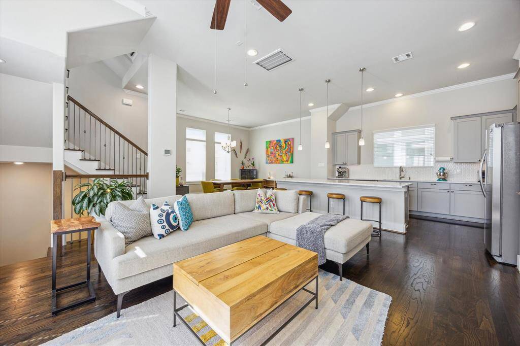 Stunning second floor living with tons of natural light and an open concept kitchen, dining and living.