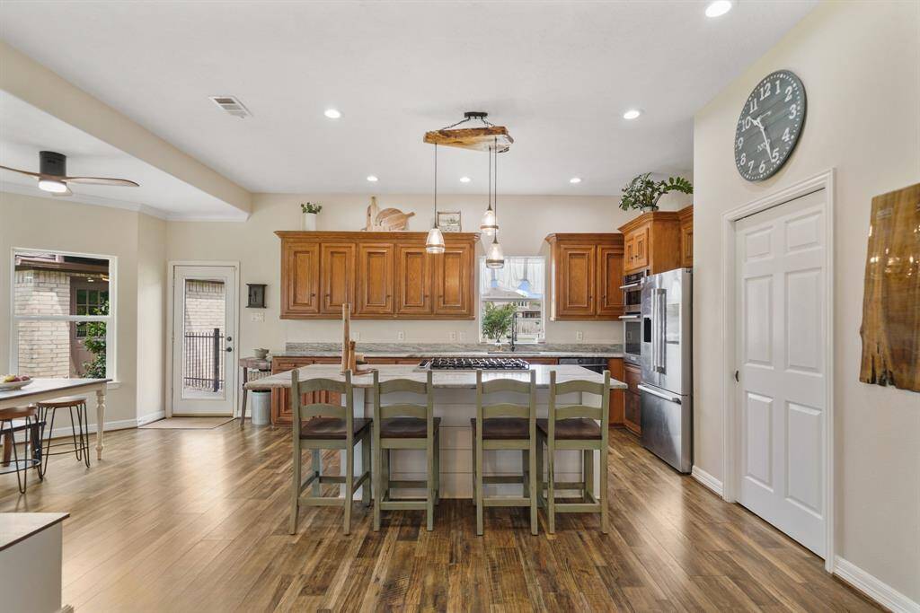 The huge island is a great addition to this spacious kitchen. Great for entertaining.