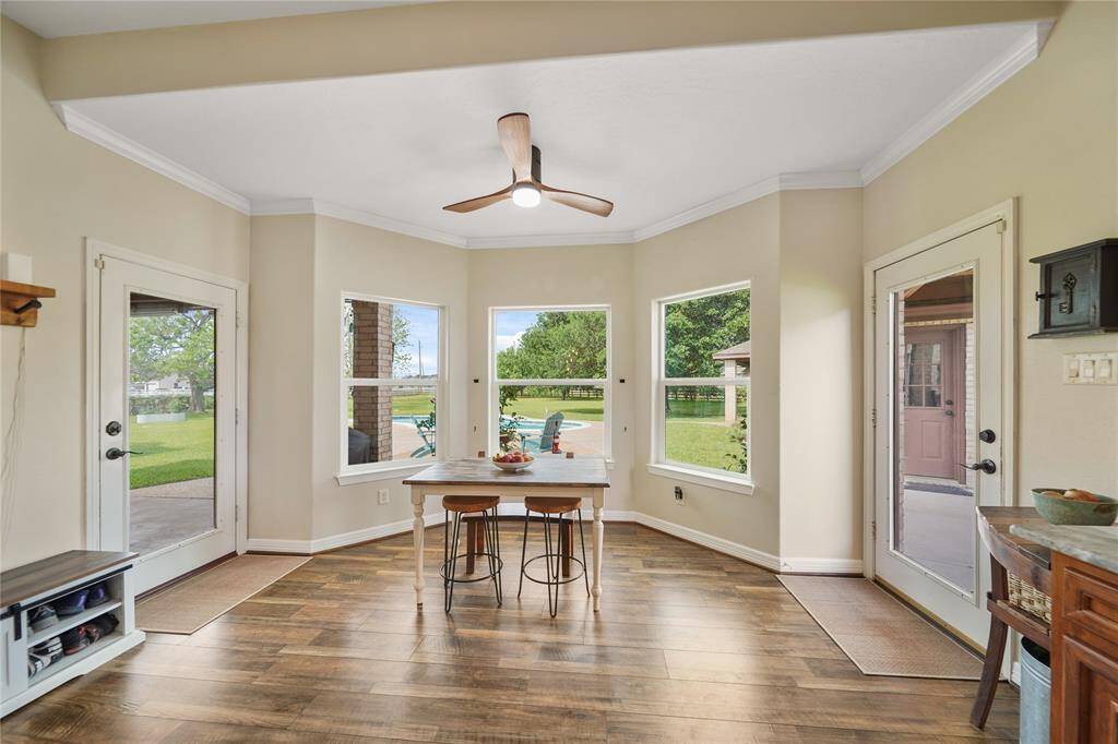 This breakfast area is a great place to take in the backyard pool views