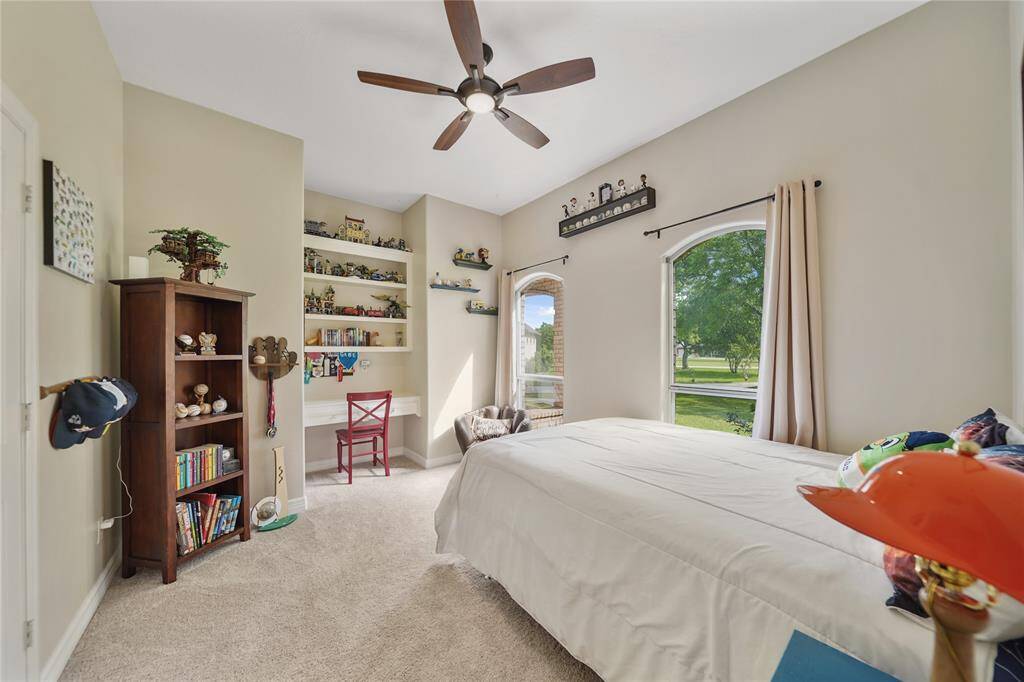 Large secondary bedroom with great closet and built in desk