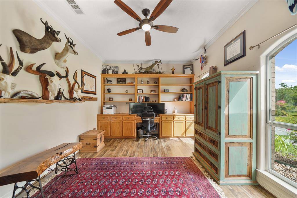 Tons of natural light fill the home office. Could be additional bedroom or great flex space.
