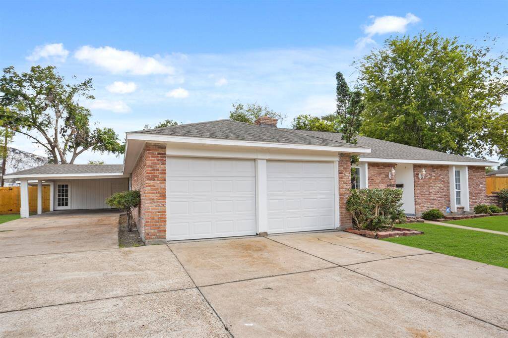 The porte-cochère on the side of the house enhances the homes curb appeal. Thank you for viewing our listing.  Call today and schedule your private showing,