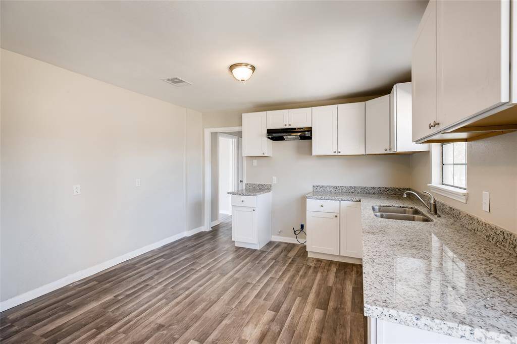 View of the kitchen. Appliances (range and dishwasher) will be installed once property is under contract.