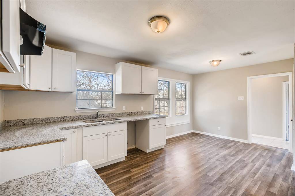Opposite view of the kitchen and breakfast nook.
