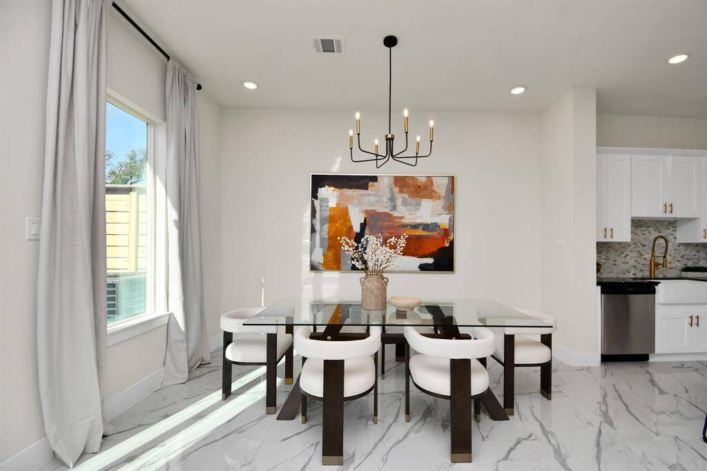 Enjoy entertaining in your dining space which is flooded with natural sunlight.
