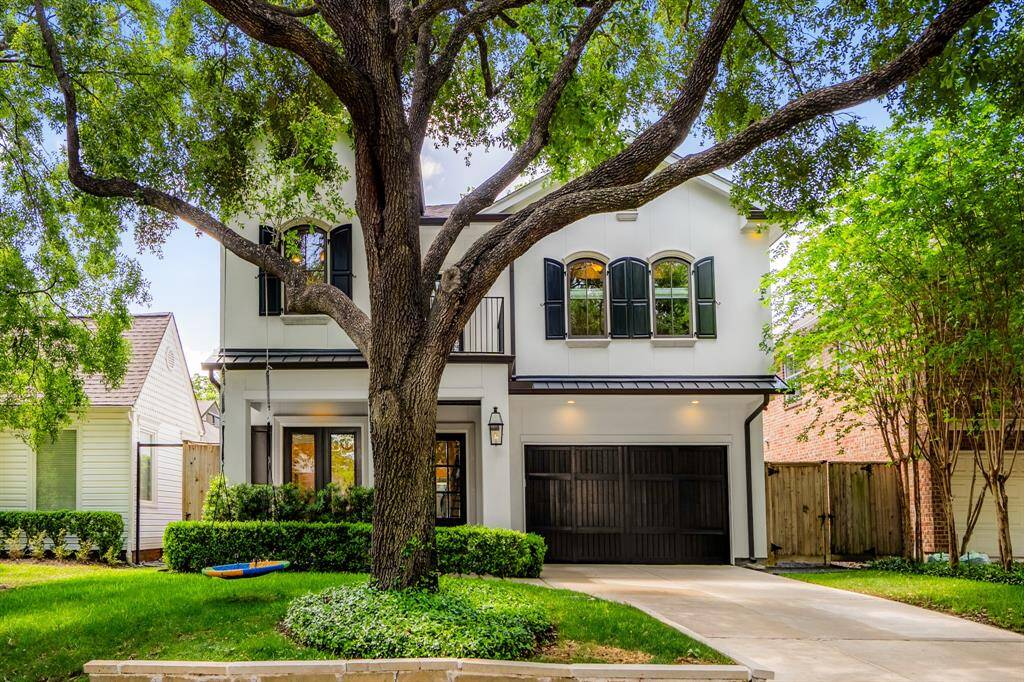 Framed by lush greenery and a mature live oak, the home’s stately presence is softened by timeless architectural details and an inviting front elevation that feels both grounded and grand. Centrally located in the heart of Houston just minutes from the Texas Medical Center, Downtown & Galleria-Area.