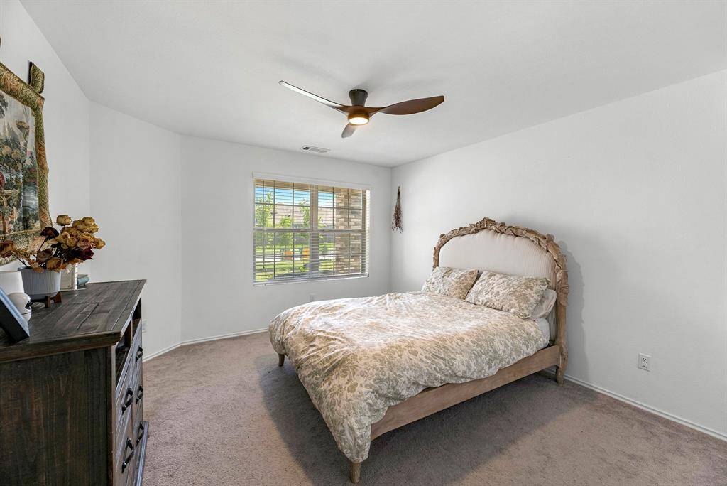 Primary Bedroom. New Ceiling Fan.