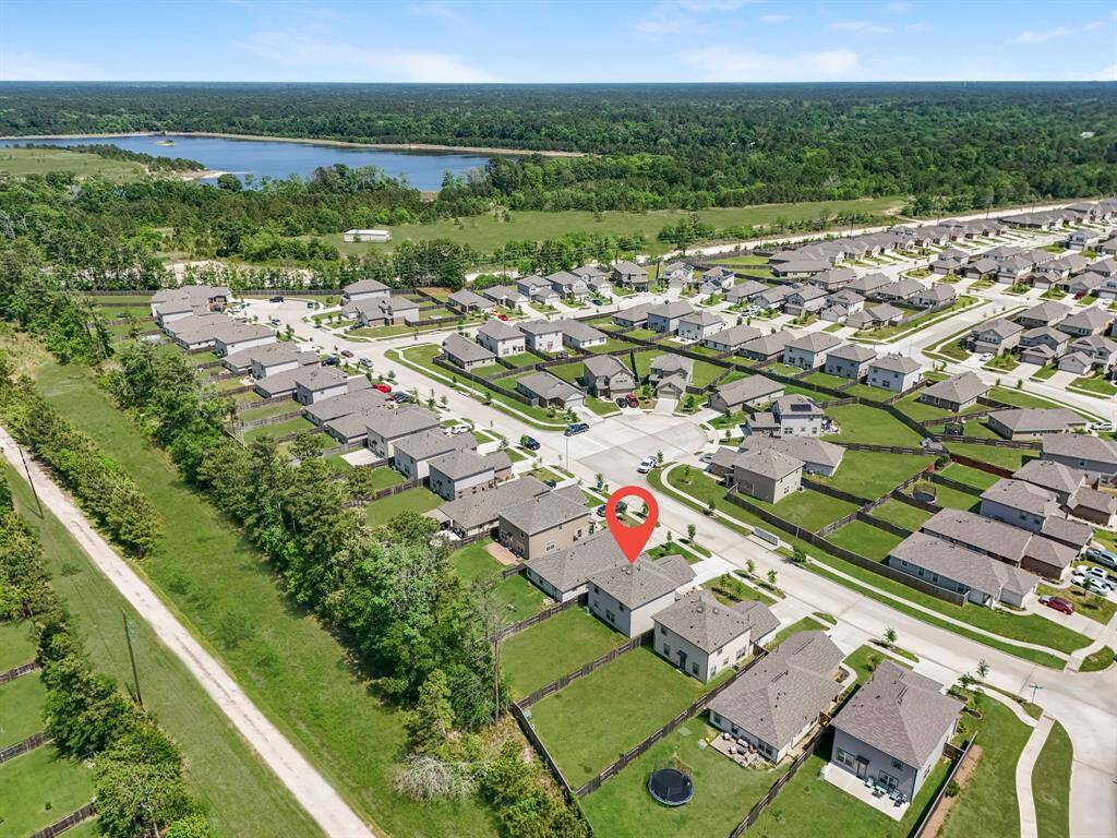 Aerial Shot of Subdivision. House located where the red dot is