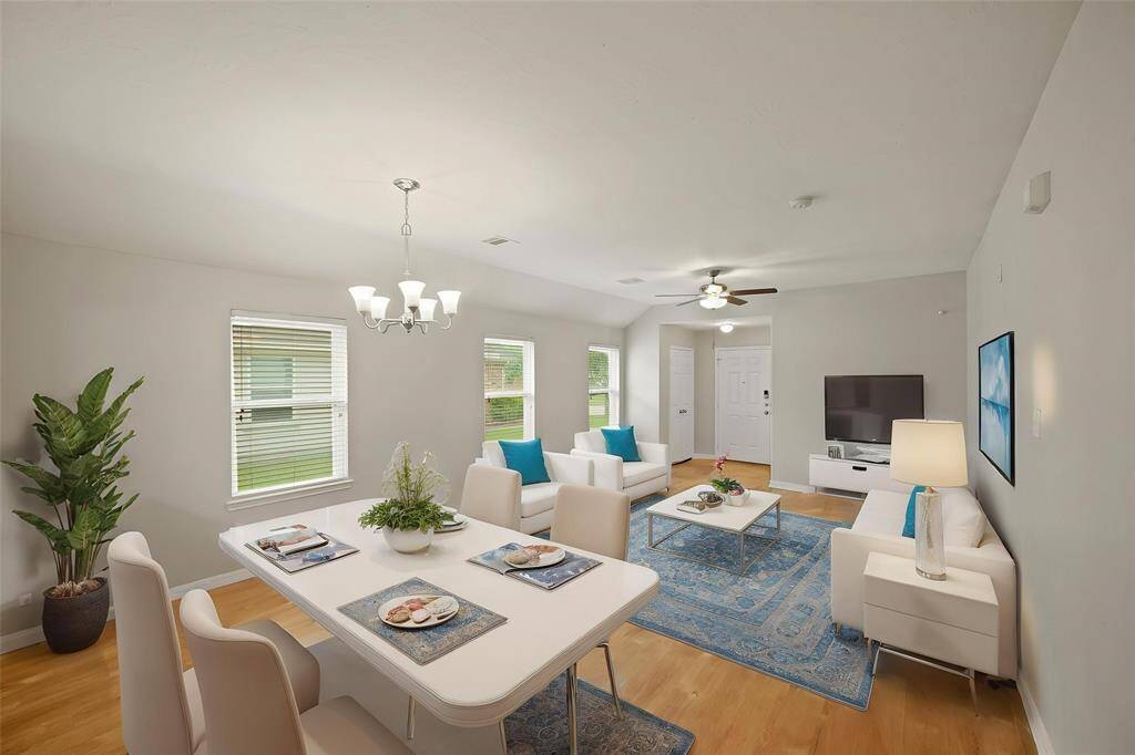 Virtually staged dining room and living room