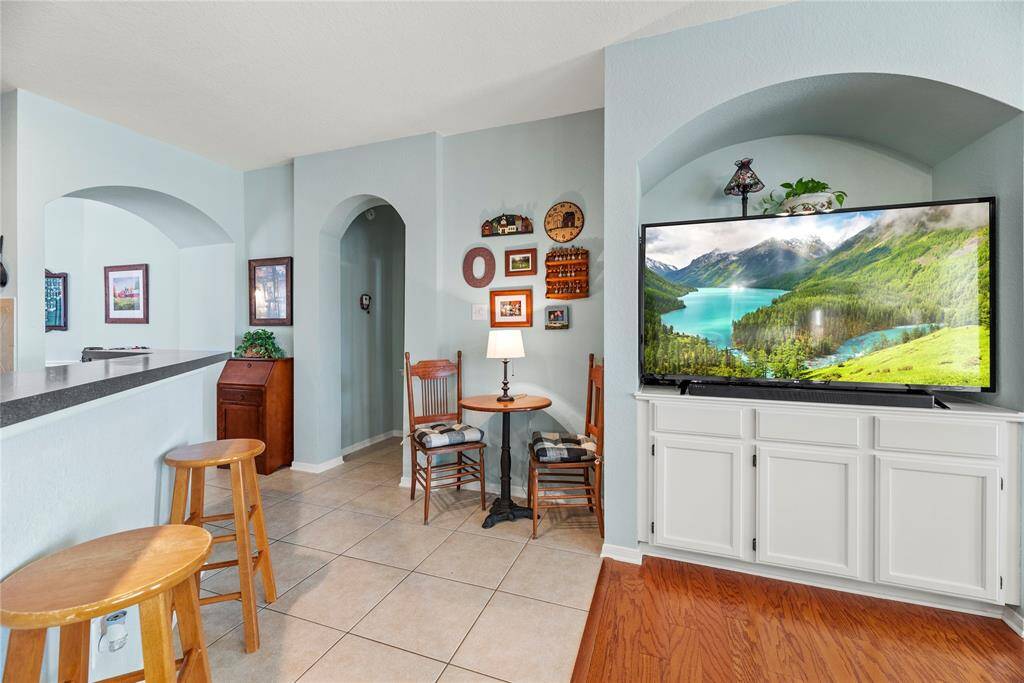 Alternate view of the living area connected to the kitchen.