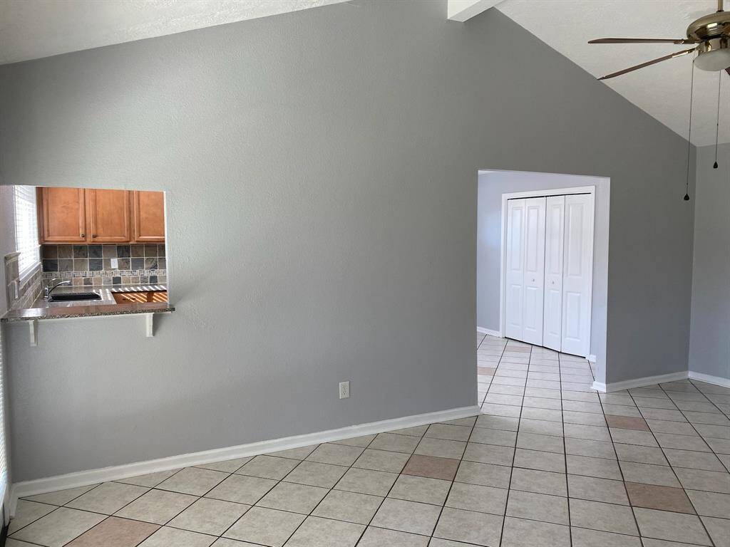 Tile throughout kitchen living room