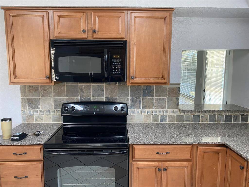 Wood cabinets kept in great condition