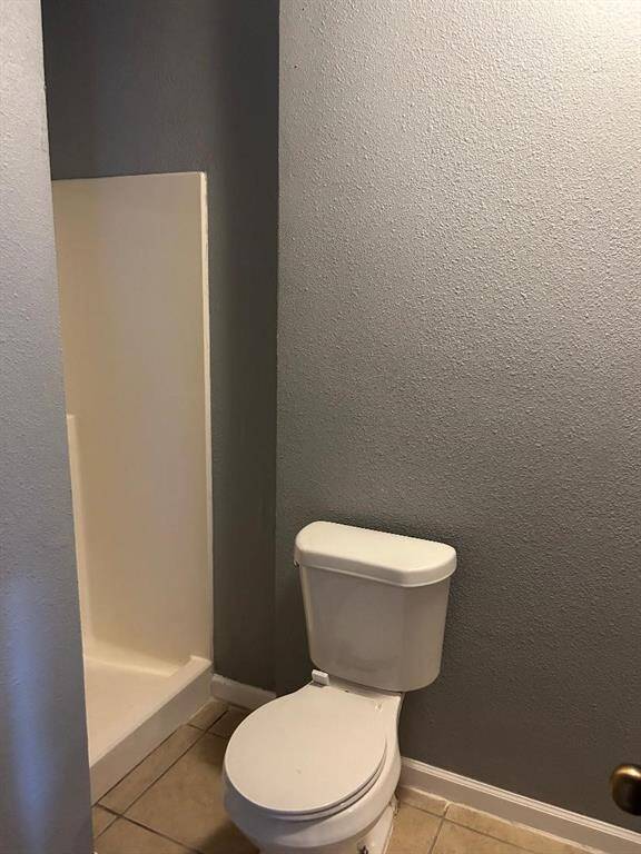 Small third bathroom in the large front bedroom.