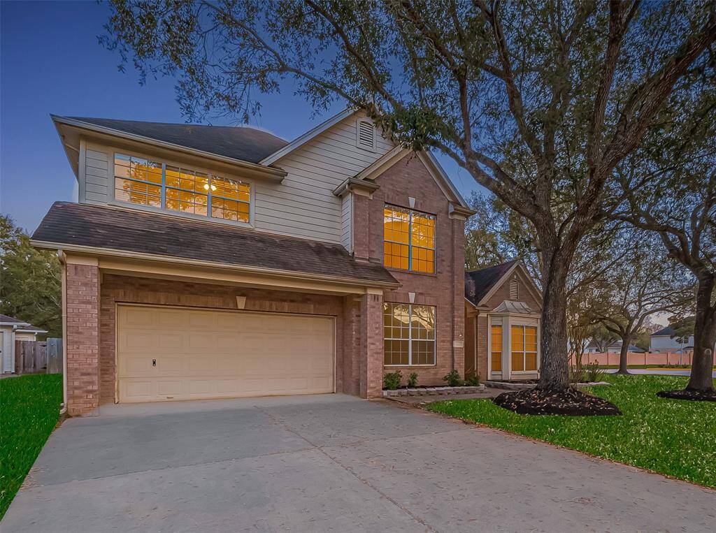Your dream home awaits! This spacious 4 bedroom home sits on huge corner lot in the gated community of Canyon Gate in Cinco Ranch!
