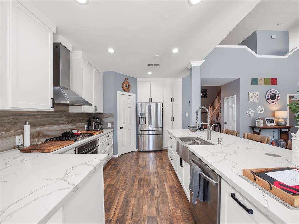 Kitchen offers ample counter and cabinet space as well as a generous pantry to store all your kitchen essentials!