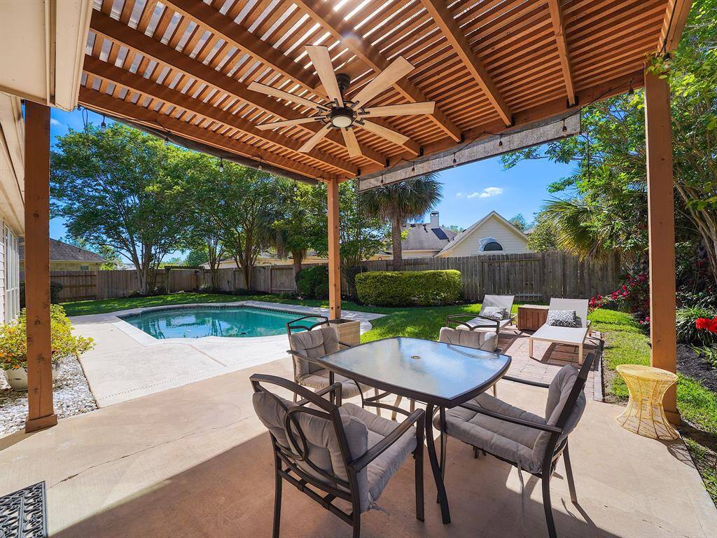 Welcome to your private oasis! This stunning property boasts a backyard designed for ultimate relaxation and entertainment. Enjoy a large patio with a pergola, perfect for outdoor dining and lounging.