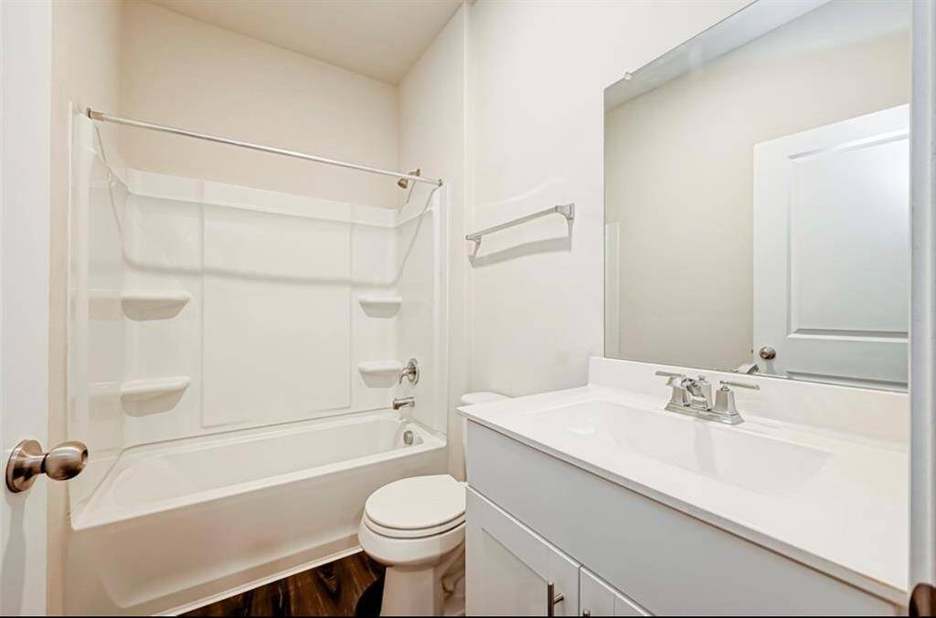Hallway full bath on first floor.