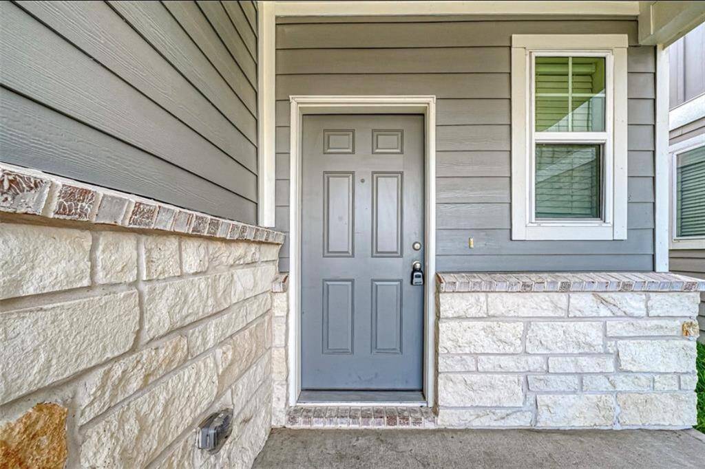 Front door with porch.