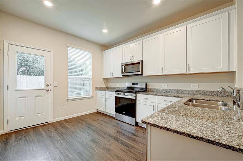 Kitchen with access to backyard