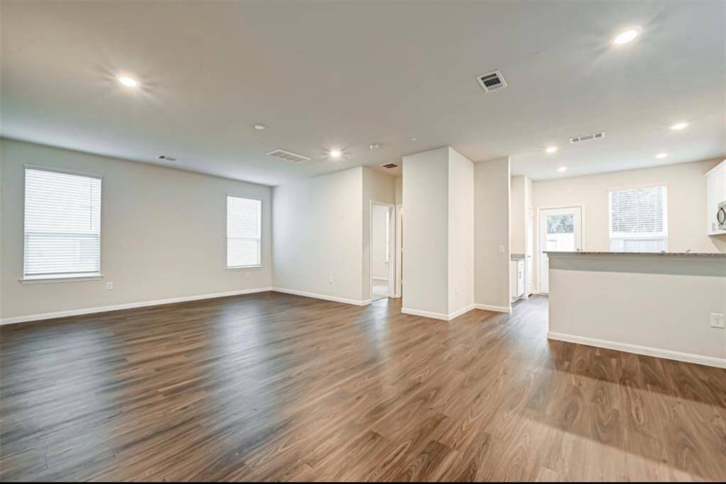 Spacious living room with luxury vinyl