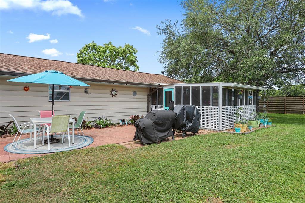 4 car garage in the background. Terrace is to the right.