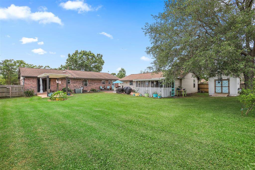 Spacious backyard. Storage building is to the right.