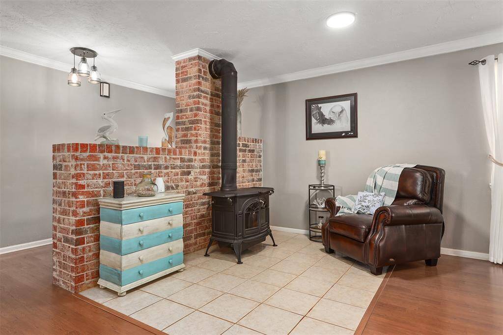 Family room has a wood burning fireplace.