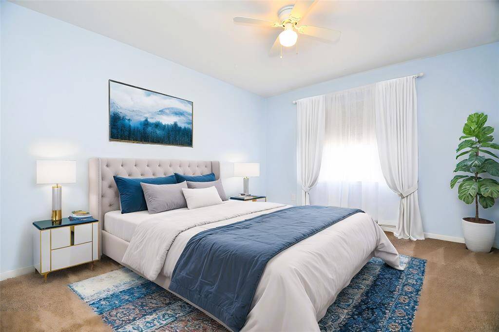 Bedroom 2 with new carpet (virtually staged)
