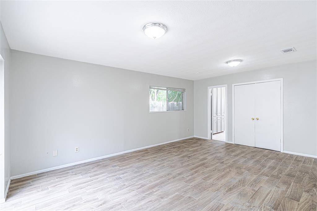 Relax in the primary bedroom with a double-door closet offering plenty of space for all your wardrobe essentials.