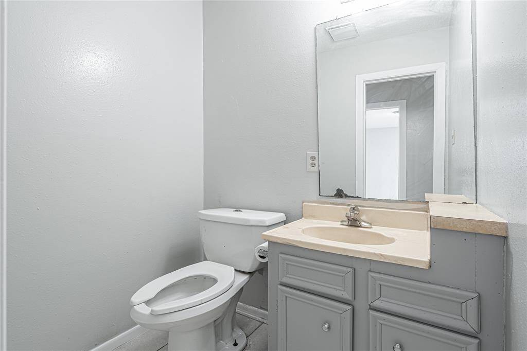 Convenient hallway half bath is perfect for guests and quick access when you need it!