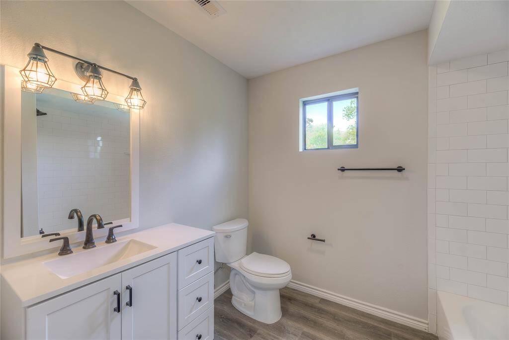 Guest bathroom , tile shower/tub