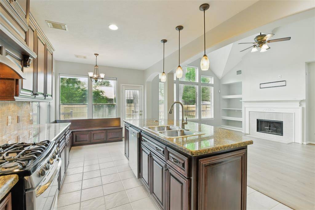 The kitchen is open to the living room providing adding to the airiness of the home.