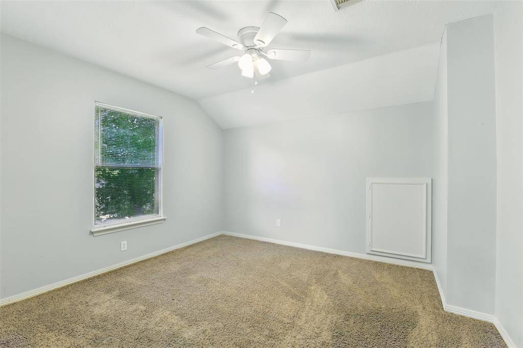 Around the corner is the next bedroom.