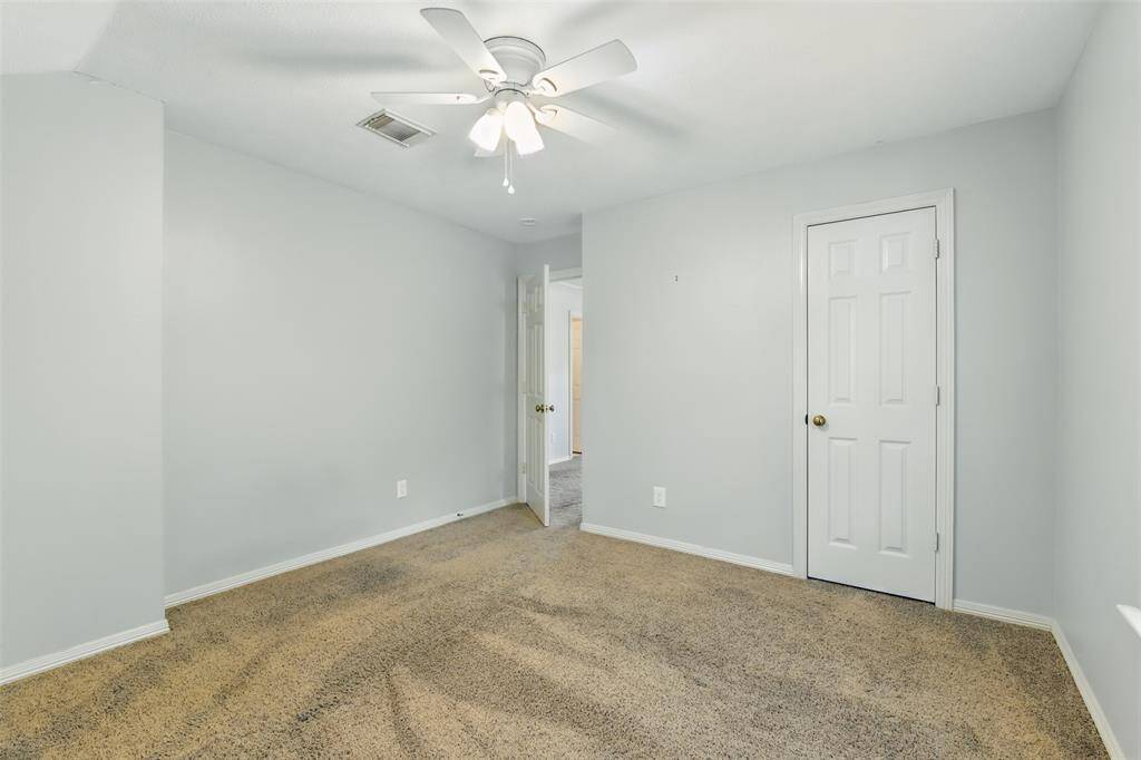 Another generously sized room with closet storage.