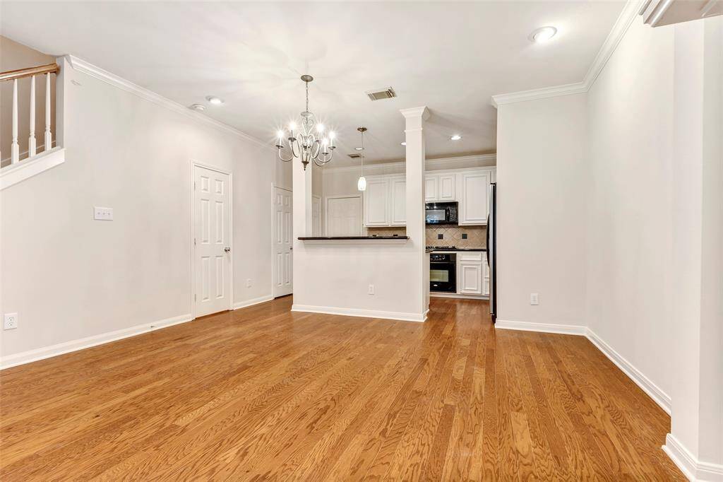 A closer look at the living room, showcasing its spacious layout and potential.