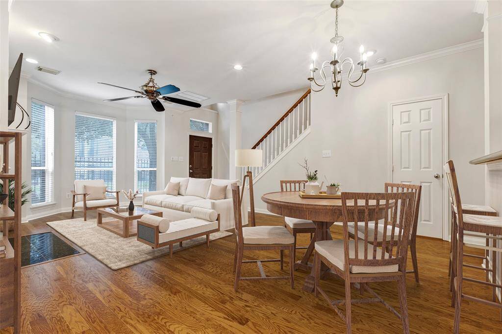 Another staged photo highlighting the spacious living room and dining area.