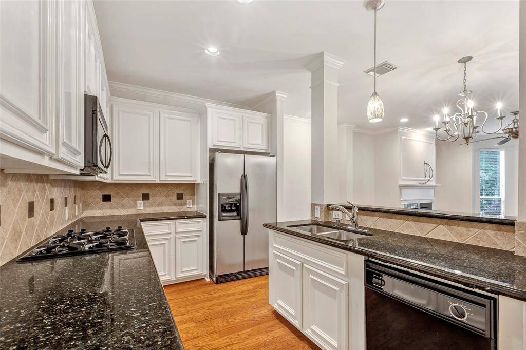 Explore the spacious kitchen layout, designed for both functionality and style!