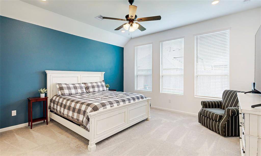 Spacious Owner's Suite: Easily fits oversized furniture with room for a cozy sitting area.