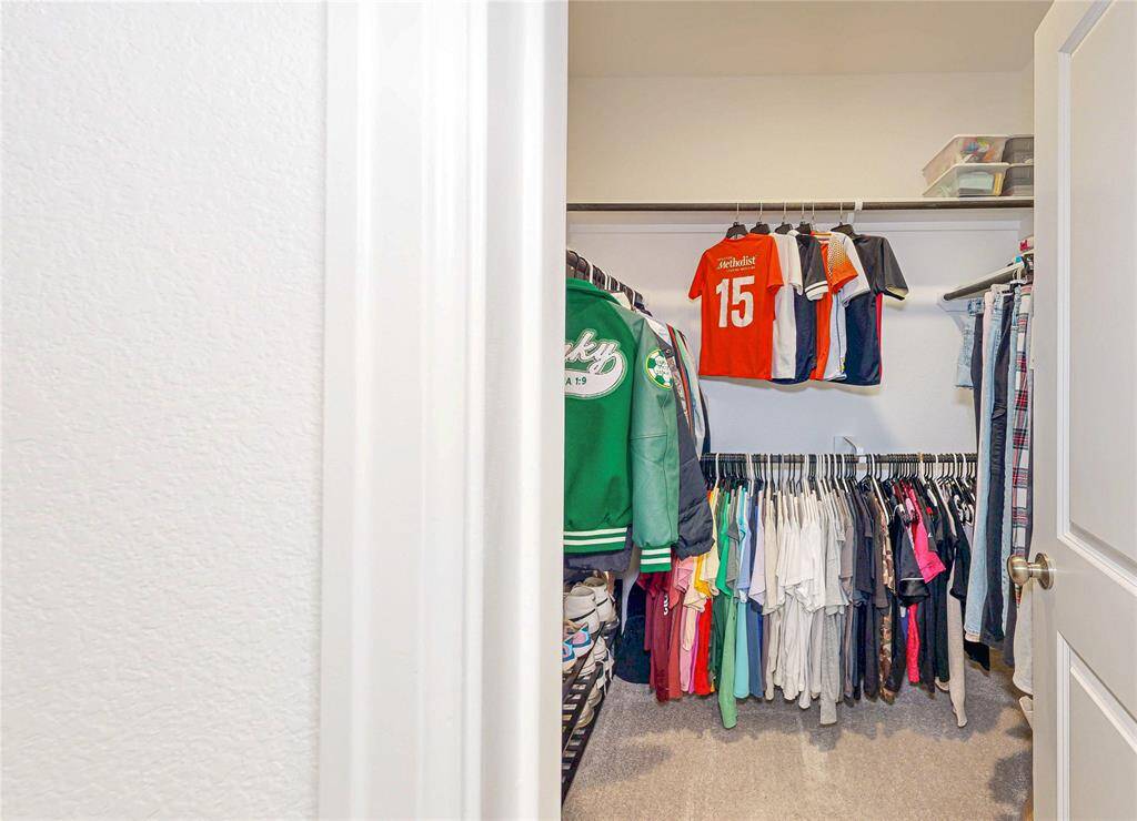 Spacious closets enhance the secondary bedrooms.
