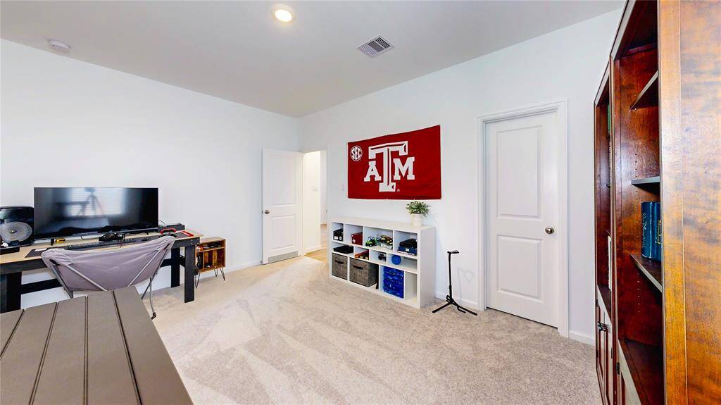 Secondary Bedroom is ideal for a 4th bedroom, or another office or study space.