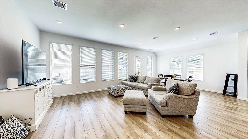 Bright and airy family room with an open layout.